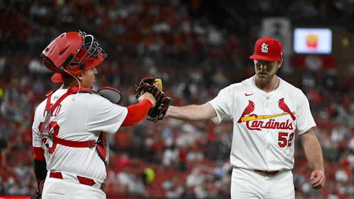 May 6, 2025; St. Louis, Missouri, USA;  St. Louis Cardinals starting pitcher Matthew Liberatore (52) celebrates with catcher Yohel Pozo (63) as they walk off the field after the seventh inning against the Pittsburgh Pirates at Busch Stadium. Mandatory Credit: Jeff Curry-Imagn Images