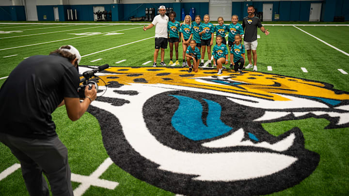 The elite 10U team has their team photo taken during a Jaguars sponsored sendoff party Sunday July 13, 2025 at Miller Electric Center in Jacksonville, Fla. for their flag football teams that they sponsor for the NFL Flag Championships next week in Canton, Ohio. 