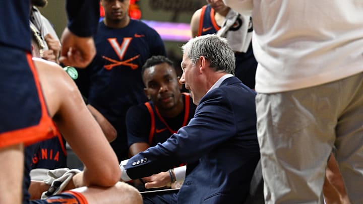 Jan 31, 2026; Chestnut Hill, Massachusetts, USA; Virginia Cavaliers head coach Ryan Odom speaks to the team during a second half timeout against the Boston College Eagles at Conte Forum. Mandatory Credit: Eric Canha-Imagn Images
