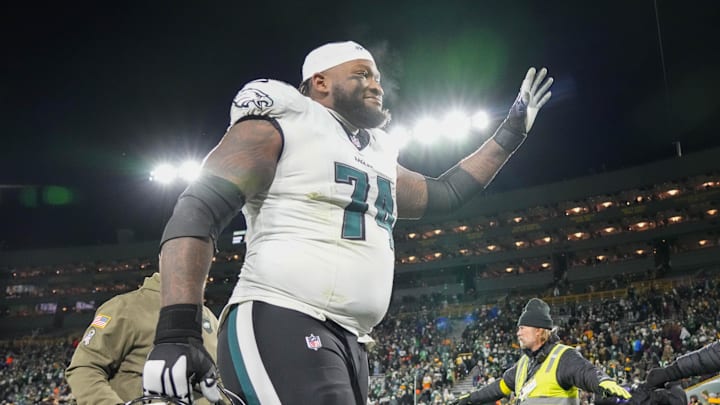 Nov 10, 2025; Green Bay, Wisconsin, USA;  Philadelphia Eagles offensive tackle Fred Johnson (74) waves to the crowd following the game against the Green Bay Packers at Lambeau Field.