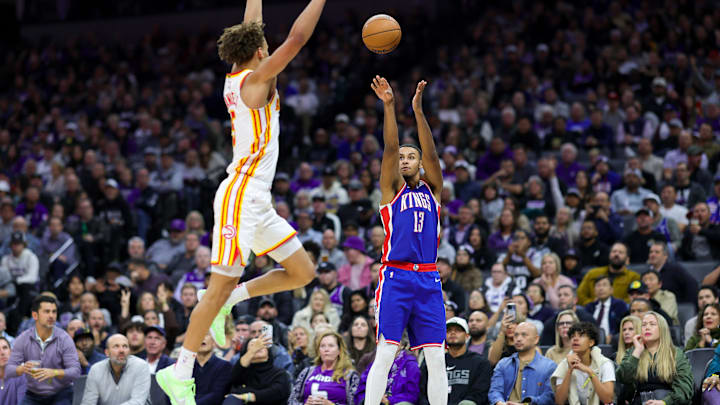 Nov 18, 2024; Sacramento, California, USA; Sacramento Kings forward Keegan Murray (13) shoots the ball against Atlanta Hawks guard Dyson Daniels (5) during the fourth quarter at Golden 1 Center. Mandatory Credit: Sergio Estrada-Imagn Images Nov 18, 2024; Sacramento, California, USA; Sacramento Kings forward Keegan Murray (13) shoots the ball against Atlanta Hawks guard Dyson Daniels (5) during the fourth quarter at Golden 1 Center. Mandatory Credit: Sergio Estrada-Imagn Images