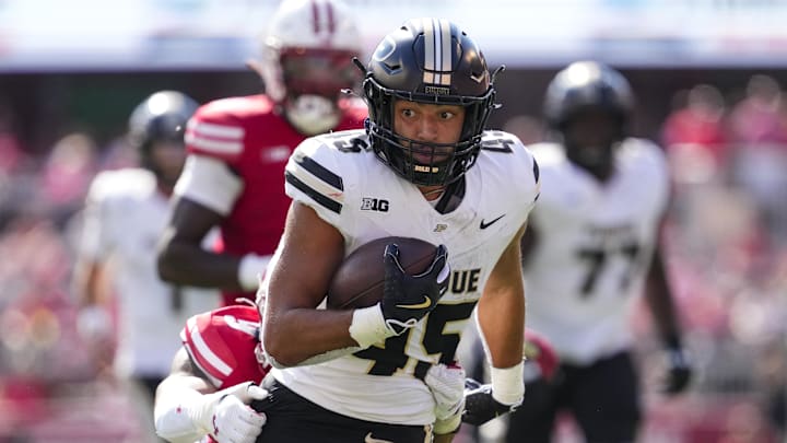 Purdue Boilermakers running back Devin Mockobee (45) rushes with the football