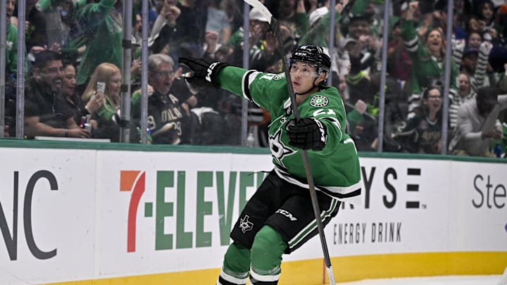 Nov 18, 2025; Dallas, Texas, USA; Dallas Stars left wing Jason Robertson (21) celebrates after he scores a goal against New York Islanders goaltender David Rittich (not pictured) during the second period at the American Airlines Center. Mandatory Credit: Jerome Miron-Imagn Images