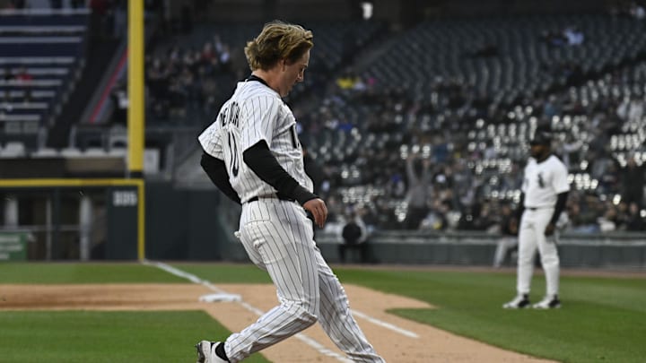 Chicago, Illinois, USA; Chicago White Sox second baseman Chase Meidroth (10) scores against the Boston Red Sox during the second inning at Guaranteed Rate Field.