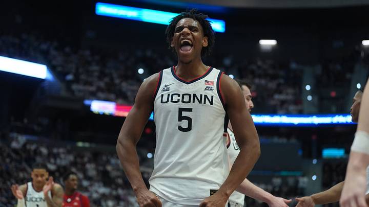 Feb 25, 2026; Hartford, Connecticut, USA; UConn Huskies forward Tarris Reed Jr. (5) reacts after a basket against the St. John's Red Storm in the second half at PeoplesBank Arena. Mandatory Credit: David Butler II-Imagn Images