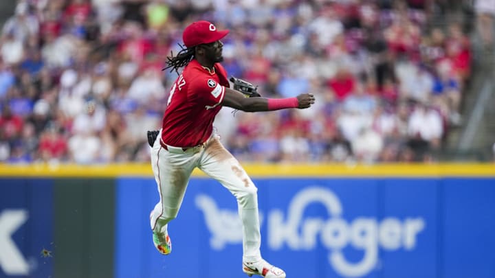 Sep 20, 2025; Cincinnati, Ohio, USA; Cincinnati Reds shortstop Elly De La Cruz (44) fields the ball and throws out Chicago Cubs outfielder Willi Castro (1) at first base in the second inning at Great American Ball Park. Mandatory Credit: Aaron Doster-Imagn Images