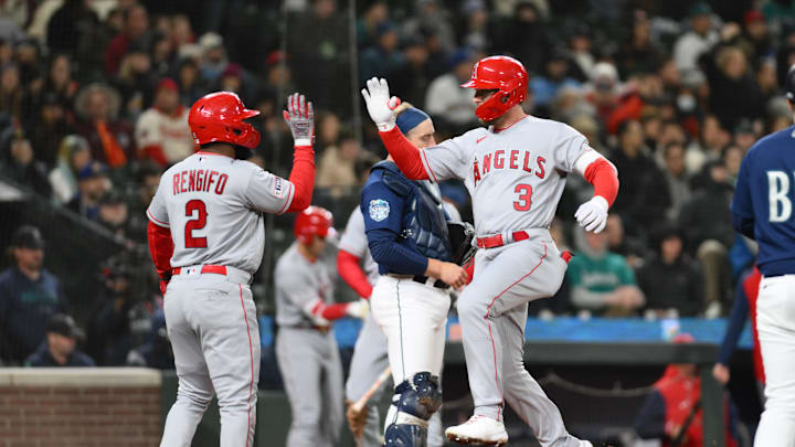 Apr 3, 2023; Seattle, Washington, USA; Los Angeles Angels left fielder Taylor Ward (3) celebrates with shortstop Luis Rengifo (2) after hitting a two-run home run against the Seattle Mariners during the eighth inning at T-Mobile Park. Mandatory Credit: Steven Bisig-Imagn Images Apr 3, 2023; Seattle, Washington, USA; Los Angeles Angels left fielder Taylor Ward (3) celebrates with shortstop Luis Rengifo (2) after hitting a two-run home run against the Seattle Mariners during the eighth inning at T-Mobile Park. Mandatory Credit: Steven Bisig-Imagn Images