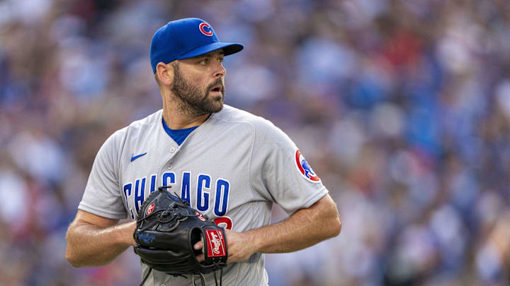 Chicago Cubs relief pitcher Michael Fulmer (32) looks on against the Toronto Blue Jays during the sixth inning at Rogers Centre in 2023. Chicago Cubs relief pitcher Michael Fulmer (32) looks on against the Toronto Blue Jays during the sixth inning at Rogers Centre in 2023.