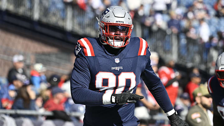 Nov 2, 2025; Foxborough, Massachusetts, USA;  New England Patriots defensive tackle Christian Barmore (90) warms up prior to the game against the Atlanta Falcons at Gillette Stadium. Mandatory Credit: Eric Canha-Imagn Images