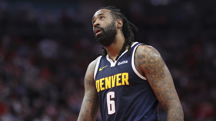 Mar 23, 2025; Houston, Texas, USA; Denver Nuggets center DeAndre Jordan (6) looks up during the game against the Houston Rockets at Toyota Center. Mandatory Credit: Troy Taormina-Imagn Images