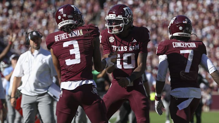 Texas A&M Aggies quarterback Marcel Reed (10) celebrates with wide receiver Ashton Bethel-Roman (3) after a touchdown during the third quarter against the South Carolina Gamecocks at Kyle Field. 