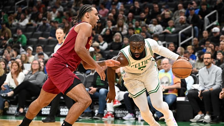 Oct 12, 2025; Boston, Massachusetts, USA; Boston Celtics guard/forward Jaylen Brown (7) drives to the basket against Cleveland Cavaliers guard/forward Jaylon Tyson (20) during the first half at TD Garden. Mandatory Credit: Brian Fluharty-Imagn Images
