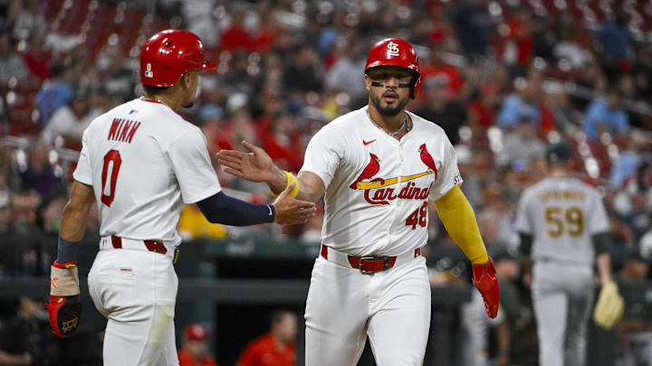 Sep 3, 2025; St. Louis, Missouri, USA;  St. Louis Cardinals designated hitter Ivan Herrera (48) celebrates with shortstop Masyn Winn (0) after they scored against the Athletics during the third inning at Busch Stadium. Mandatory Credit: Jeff Curry-Imagn Images