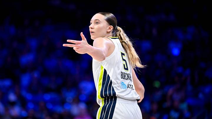 Sep 19, 2026; Arlington, Texas, USA; Dallas Wings guard Paige Bueckers (5) celebrates during the game between the Wings and the Mercury at College Park Center. Mandatory Credit: Jerome Miron-Imagn Images