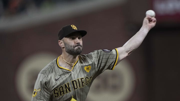 Sep 13, 2024; San Francisco, California, USA;  San Diego Padres relief pitcher Tanner Scott (66) pitches during the seventh inning against the San Francisco Giants at Oracle Park. Mandatory Credit: Stan Szeto-Imagn Images