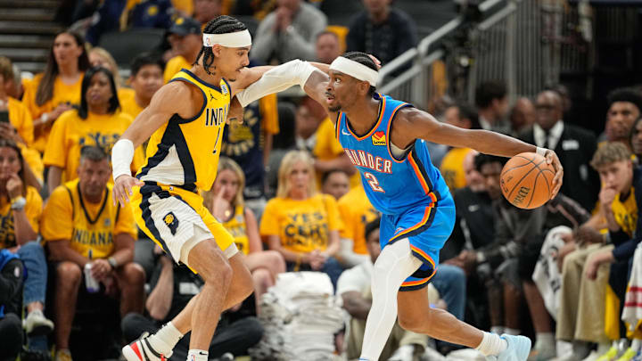 Jun 19, 2025; Indianapolis, Indiana, USA; Oklahoma City Thunder guard Shai Gilgeous-Alexander (2) dribbles the ball defended by Indiana Pacers guard Andrew Nembhard (2) in the third quarter during game six of the 2025 NBA Finals at Gainbridge Fieldhouse. Mandatory Credit: Kyle Terada-Imagn Images