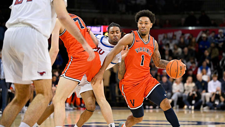 Jan 17, 2026; Dallas, Texas, USA; Virginia Cavaliers guard Malik Thomas (1) brings the ball up court against the SMU Mustangs during the first half at Moody Coliseum. Mandatory Credit: Jerome Miron-Imagn Images