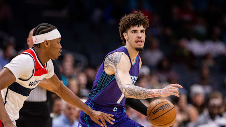 Mar 1, 2025; Charlotte, North Carolina, USA; Charlotte Hornets guard LaMelo Ball (1) brings the ball up court against the Washington Wizards during the first quarter at Spectrum Center. Mandatory Credit: Scott Kinser-Imagn Images