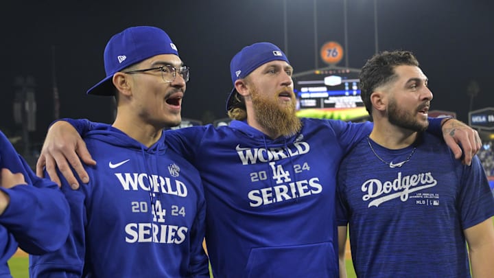 Oct 25, 2024; Los Angeles, California, USA; Los Angeles Dodgers relief pitcher Anthony Banda (43) relief pitcher Michael Kopech (45) and relief pitcher Alex Vesia (51) celebrate defeating the New York Yankees during game one of the 2024 MLB World Series at Dodger Stadium. Mandatory Credit: Jayne Kamin-Oncea-Imagn Images Oct 25, 2024; Los Angeles, California, USA; Los Angeles Dodgers relief pitcher Anthony Banda (43) relief pitcher Michael Kopech (45) and relief pitcher Alex Vesia (51) celebrate defeating the New York Yankees during game one of the 2024 MLB World Series at Dodger Stadium. Mandatory Credit: Jayne Kamin-Oncea-Imagn Images