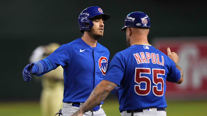 Sep 16, 2023; Phoenix, Arizona, USA; Chicago Cubs first baseman Cody Bellinger (24) slaps hands with