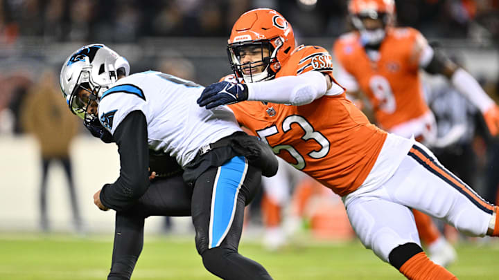 T.J. Edwards makes a tackle of Panthers QB Bryce Young last year at Soldier Field. Young has been benched in favor of Andy Dalton for this year's rematch.