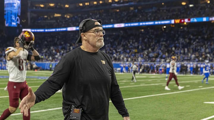 Washington Commanders head coach Dan Quinn walks off the field after the win against Detroit Lions at Ford Field.