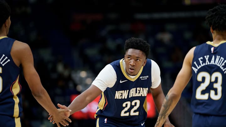 Dec 2, 2025; New Orleans, Louisiana, USA; New Orleans Pelicans center Derik Queen (22) ceelbrates with forward Trey Murphy III (25) and guard Trey Alexander (23) during the first half against the Minnesota Timberwolves at Smoothie King Center. Mandatory Credit: Matthew Hinton-Imagn Images Dec 2, 2025; New Orleans, Louisiana, USA; New Orleans Pelicans center Derik Queen (22) ceelbrates with forward Trey Murphy III (25) and guard Trey Alexander (23) during the first half against the Minnesota Timberwolves at Smoothie King Center. Mandatory Credit: Matthew Hinton-Imagn Images
