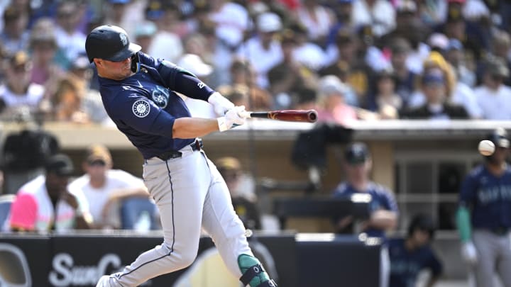 Seattle Mariners first baseman Ty France (23) hits a single against the San Diego Padres during the fourth inning at Petco Park. Mandatory Credit: Orlando Ramirez-USA TODAY Sports Seattle Mariners first baseman Ty France (23) hits a single against the San Diego Padres during the fourth inning at Petco Park. Mandatory Credit: Orlando Ramirez-USA TODAY Sports