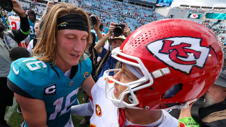 Sep 17, 2023; Jacksonville, Florida, USA;  Jacksonville Jaguars quarterback Trevor Lawrence (16) greets Kansas City Chiefs quarterback Patrick Mahomes (15) after a game at EverBank Stadium. Mandatory Credit: Nathan Ray Seebeck-USA TODAY Sports