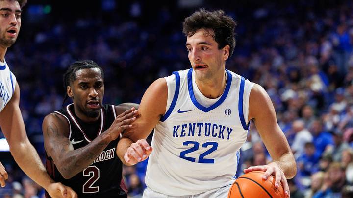 Oct 16, 2026; Lexington, KY, USA; Kentucky Wildcats forward Milan Momcilovic (22) drives to the basket against Little Rock Trojans guard Jah'Likai King (2) during the second half at Rupp Arena Central Bank Center. Mandatory Credit: Jordan Prather-Imagn Images Oct 16, 2026; Lexington, KY, USA; Kentucky Wildcats forward Milan Momcilovic (22) drives to the basket against Little Rock Trojans guard Jah'Likai King (2) during the second half at Rupp Arena Central Bank Center. Mandatory Credit: Jordan Prather-Imagn Images