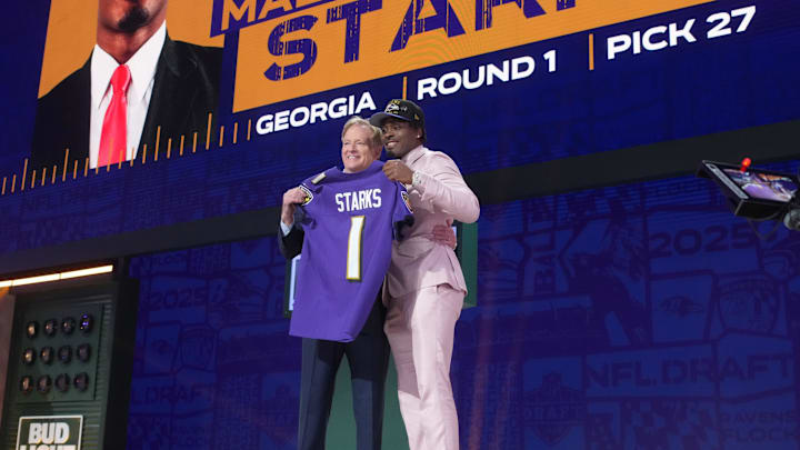 Apr 24, 2025; Green Bay, WI, USA; NFL commissioner Roger Goodell with Georgia Bulldogs safety Malaki Starks after he is selected by the Baltimore Ravens as the number 27 pick in the first round of the 2025 NFL Draft at Lambeau Field. Mandatory Credit: Kirby Lee-Imagn Images