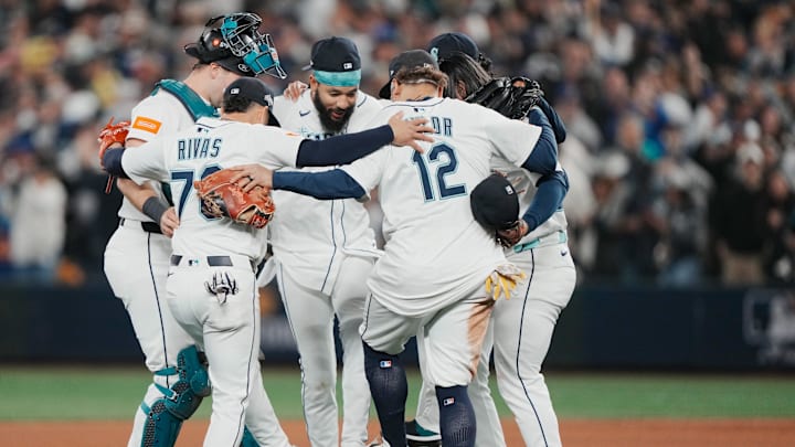 Oct 17, 2025; Seattle, Washington, USA; The Seattle Mariners celebrate after defeating the Toronto Blue Jays in game five of the ALCS round for the 2025 MLB playoffs at T-Mobile Park. Mandatory Credit: Stephen Brashear-Imagn Images Oct 17, 2025; Seattle, Washington, USA; The Seattle Mariners celebrate after defeating the Toronto Blue Jays in game five of the ALCS round for the 2025 MLB playoffs at T-Mobile Park. Mandatory Credit: Stephen Brashear-Imagn Images