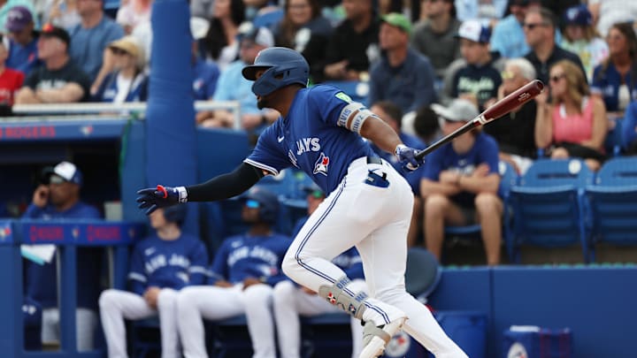 Toronto Blue Jays second base Orelvis Martinez (13) hits a home run during the fourth inning against the New York Yankees at TD Ballpark on Feb 22.