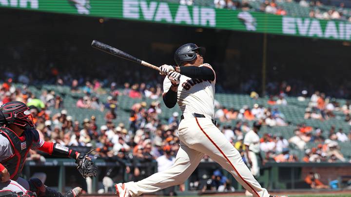 Aug 26, 2026; San Francisco, California, USA;  San Francisco Giants first baseman Rafael Devers (16) hits a two run home run during the fifth inning against the Cincinnati Reds at Oracle Park.  Mandatory Credit: Sergio Estrada-Imagn Images