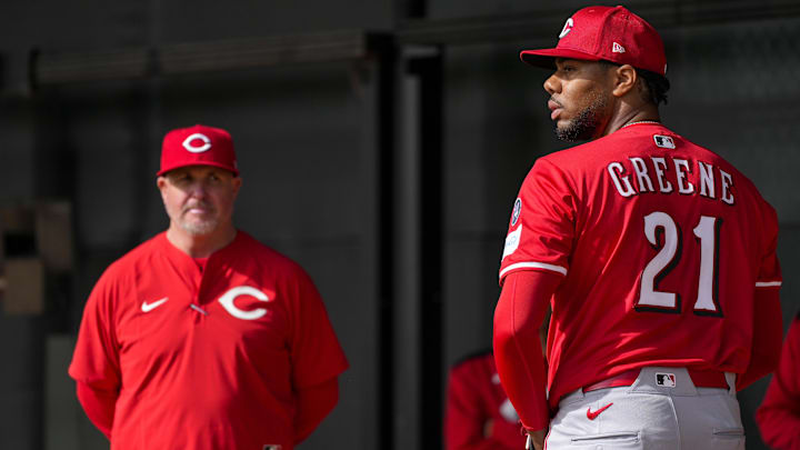 Cincinnati Reds pitcher Hunter Greene (21) throws a bullpen session as pitching coach/director of pitching Derek Johnson (36) watches at the Cincinnati Reds Player Development Complex in Goodyear, Ariz., on  Thursday, Feb. 13, 2025. Mandatory Credit: Sam Greene/USA TODAY NETWORK via Imagn Images