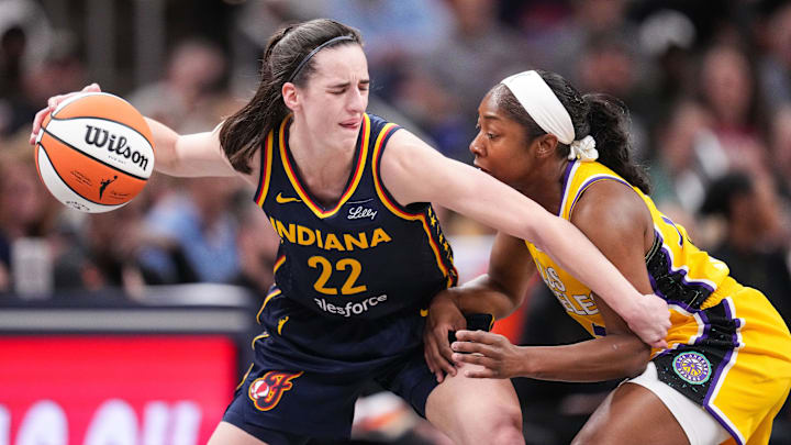 Indiana Fever guard Caitlin Clark (22) rushes up the court Tuesday, May 28, 2024, during the game at Gainbridge Fieldhouse in Indianapolis. The Los Angeles Sparks defeated the Indiana Fever, 88-82.