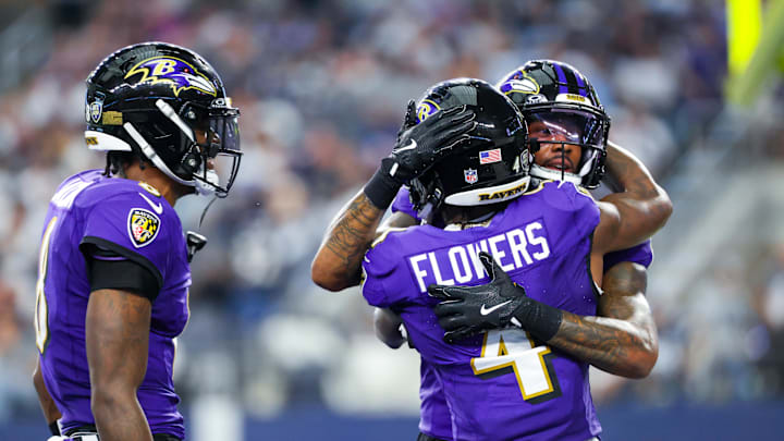 Sep 22, 2024; Arlington, Texas, USA;  Baltimore Ravens wide receiver Rashod Bateman (7) celebrates with Baltimore Ravens wide receiver Zay Flowers (4) and Baltimore Ravens quarterback Lamar Jackson (8) after catching a touchdown  during the second quarter at AT&T Stadium. Mandatory Credit: Kevin Jairaj-Imagn Images