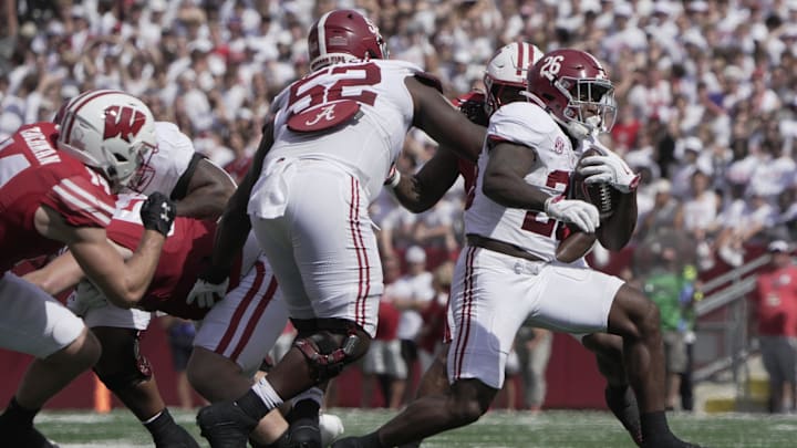 Sep 14, 2024; Madison, Wisconsin, USA; Alabama Crimson Tide running back Jam Miller (26) runs the ball against the Wisconsin Badgers during the second quarter at Camp Randall Stadium. Mandatory Sep 14, 2024; Madison, Wisconsin, USA; Alabama Crimson Tide running back Jam Miller (26) runs the ball against the Wisconsin Badgers during the second quarter at Camp Randall Stadium. Mandatory