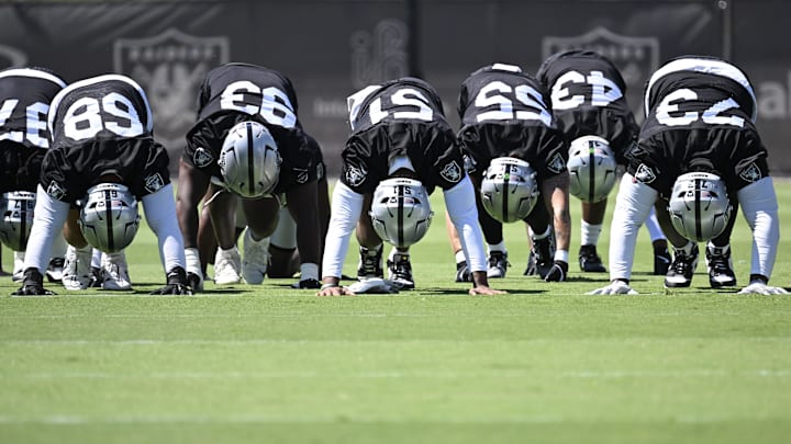 Jun 11, 2025; Henderson, NV, USA; Members of the Las Vegas Raiders warm up during Las Vegas Raiders Minicamp at Intermountain Health Performance Center. Mandatory Credit: Candice Ward-Imagn Images