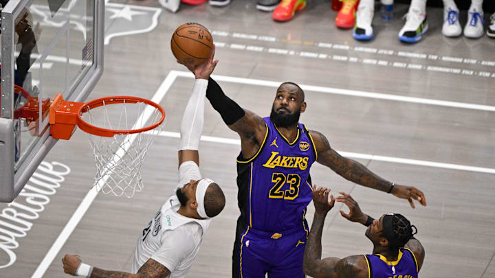 Apr 9, 2025; Dallas, Texas, USA; Dallas Mavericks center Daniel Gafford (21) and Los Angeles Lakers forward LeBron James (23) in action during the game between the Dallas Mavericks and the Los Angeles Lakers at American Airlines Center. Mandatory Credit: Jerome Miron-Imagn Images