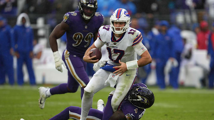Oct 2, 2022; Baltimore, Maryland, USA; Buffalo Bills quarterback Josh Allen (17) runs for a first down in the third quarter against the Baltimore Ravens at M&T Bank Stadium. Oct 2, 2022; Baltimore, Maryland, USA; Buffalo Bills quarterback Josh Allen (17) runs for a first down in the third quarter against the Baltimore Ravens at M&T Bank Stadium.