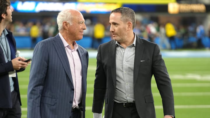 Philadelphia Eagles owner Jeffrey Lurie and general manager Howie Roseman talk before the game against the Los Angeles Chargers at SoFi Stadium. 