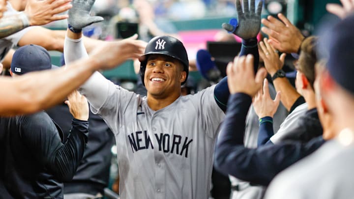Sep 4, 2024; Arlington, Texas, USA; New York Yankees outfielder Juan Soto (22) celebrates with teammates after hitting a two run home run during the fifth inning against the Texas Rangers at Globe Life Field. Sep 4, 2024; Arlington, Texas, USA; New York Yankees outfielder Juan Soto (22) celebrates with teammates after hitting a two run home run during the fifth inning against the Texas Rangers at Globe Life Field.