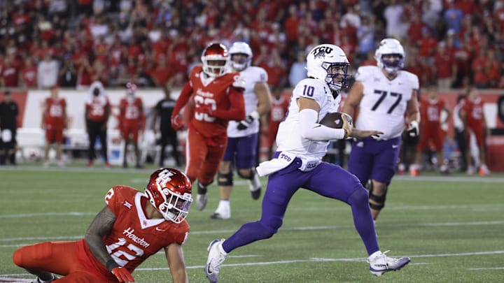 Nov 22, 2025; Houston, Texas, USA; TCU Horned Frogs quarterback Josh Hoover (10) runs with the ball during the fourth quarter against the Houston Cougars at TDECU Stadium. Mandatory Credit: Troy Taormina-Imagn Images