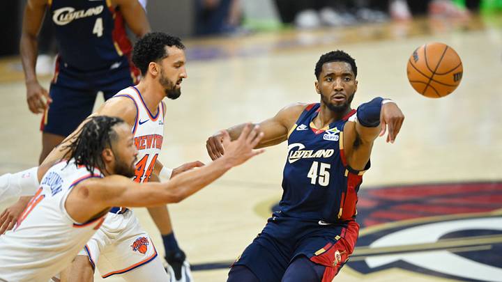 May 23, 2026; Cleveland, Ohio, USA; Cleveland Cavaliers guard Donovan Mitchell (45) passes while defended by New York Knicks guard Jalen Brunson (11) in the first quarter during game three of the eastern conference finals for the 2026 NBA playoffs at Rocket Arena. Mandatory Credit: David Richard-Imagn Images May 23, 2026; Cleveland, Ohio, USA; Cleveland Cavaliers guard Donovan Mitchell (45) passes while defended by New York Knicks guard Jalen Brunson (11) in the first quarter during game three of the eastern conference finals for the 2026 NBA playoffs at Rocket Arena. Mandatory Credit: David Richard-Imagn Images