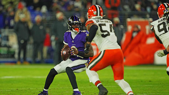 Jan 4, 2025; Baltimore, Maryland, USA; Baltimore Ravens quarterback Lamar Jackson (8) runs the ball during the second quarter against Cleveland Browns defensive end Ogbo Okoronkwo (54) at M&T Bank Stadium. Mandatory Credit: Mitch Stringer-Imagn Images Jan 4, 2025; Baltimore, Maryland, USA; Baltimore Ravens quarterback Lamar Jackson (8) runs the ball during the second quarter against Cleveland Browns defensive end Ogbo Okoronkwo (54) at M&T Bank Stadium. Mandatory Credit: Mitch Stringer-Imagn Images