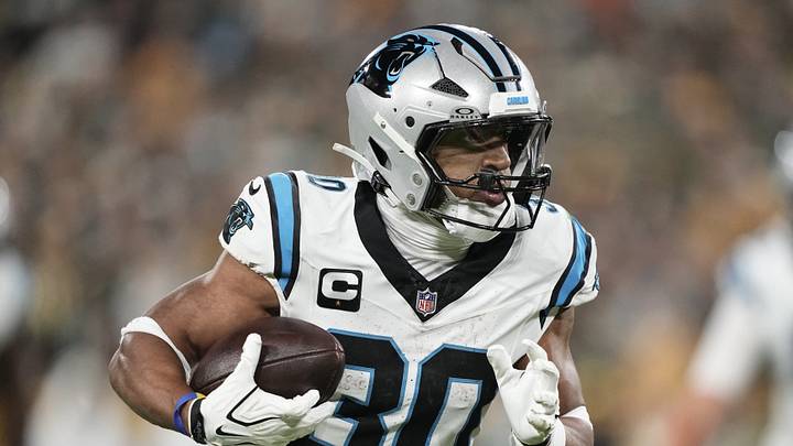 Oct 29, 2026; Green Bay, Wisconsin, USA;  Carolina Panthers running back Chuba Hubbard (30) rushes the ball against the Green Bay Packers in the first half at Lambeau Field.  Mandatory Credit: Jeff Hanisch-Imagn Images