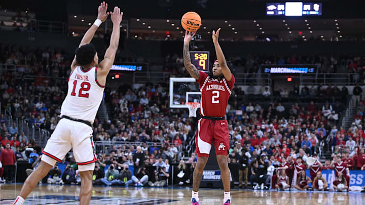 Mar 22, 2025; Providence, RI, USA; Arkansas Razorbacks guard Boogie Fland (2) shoots against St. John's Red Storm guard RJ Luis Jr. (12) during the first half of a second round men’s NCAA Tournament game at Amica Mutual Pavilion. Mandatory Credit: Brian Fluharty-Imagn Images Mar 22, 2025; Providence, RI, USA; Arkansas Razorbacks guard Boogie Fland (2) shoots against St. John's Red Storm guard RJ Luis Jr. (12) during the first half of a second round men’s NCAA Tournament game at Amica Mutual Pavilion. Mandatory Credit: Brian Fluharty-Imagn Images