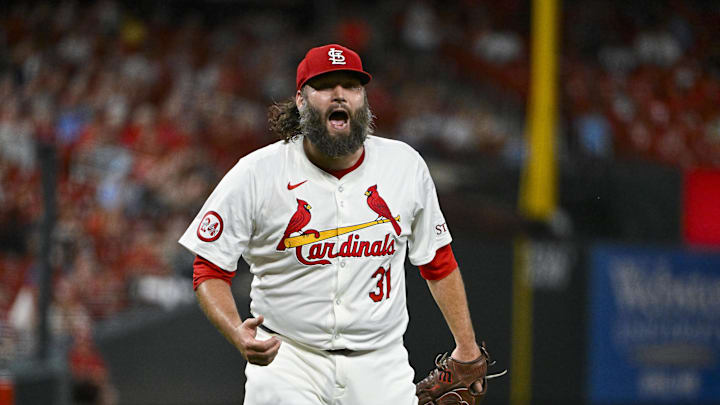 Sep 17, 2024; St. Louis, Missouri, USA;  St. Louis Cardinals starting pitcher Lance Lynn (31) reacts after inning ending double play against the Pittsburgh Pirates during the fifth inning at Busch Stadium. Mandatory Credit: Jeff Curry-Imagn Images