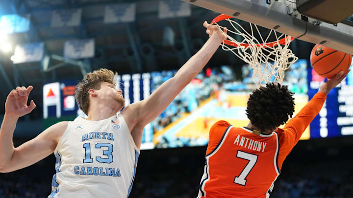 Feb 2, 2026; Chapel Hill, North Carolina, USA;  Syracuse Orange forward Kiyan Anthony (7) shoots as North Carolina Tar Heels center Henri Veesaar (13) defends in the first half at Dean E. Smith Center. Mandatory Credit: Bob Donnan-Imagn Images